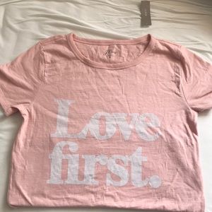 Baby pink soft “Love First” J Crew graphic tee💗